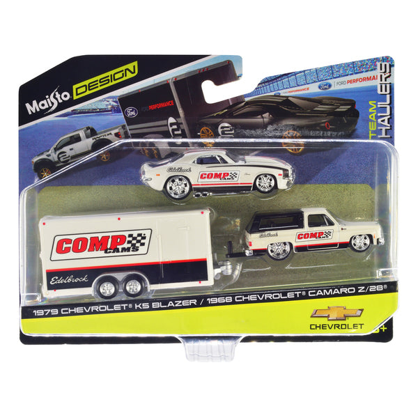 1979 Chevrolet K5 Blazer White and Black and 1968 Chevrolet Camaro Z/28 White with Stripes with Enclosed Car Trailer "Comp Cams - Edlebrock" "Team Haulers" Series 1/64 Diecast Model Car by Maisto