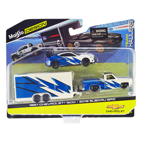 1987 Chevrolet 1500 Pickup Truck White with Blue Graphics and 2019 Subaru BRZ White with Blue Graphics with Enclosed Car Trailer "Team Haulers" Series 1/64 Diecast Model Car by Maisto