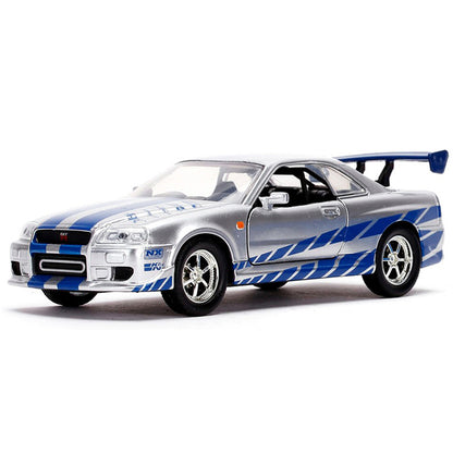 Brian's Nissan Skyline GT-R (BNR34) Silver with Blue Stripes and Nissan GT-R (BNR34) Blue Metallic Set of 2 pieces "Fast & Furious" Series 1/32 Diecast Model Cars by Jada