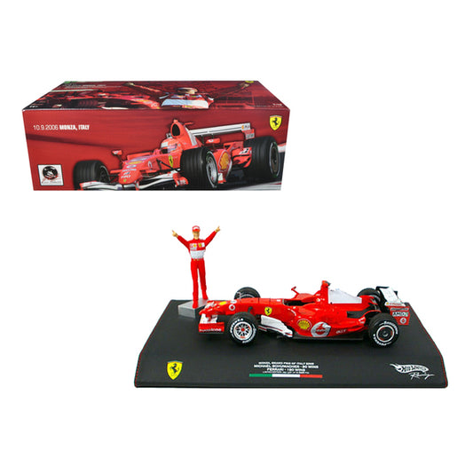 Ferrari #5 Michael Schumacher Winner F1 Formula One Monza Italian GP (2006) with Michael Schumacher Figurine 1/18 Diecast Model Car by Hot Wheels