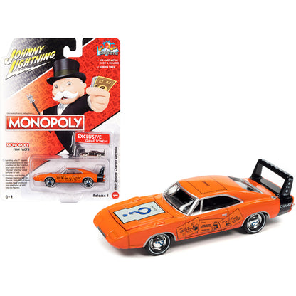 1969 Dodge Charger Daytona "Chance" Orange with Black Tail Stripe and Graphics with Game Token "Monopoly" "Pop Culture" 2022 Release 1 1/64 Diecast Model Car by Johnny Lightning