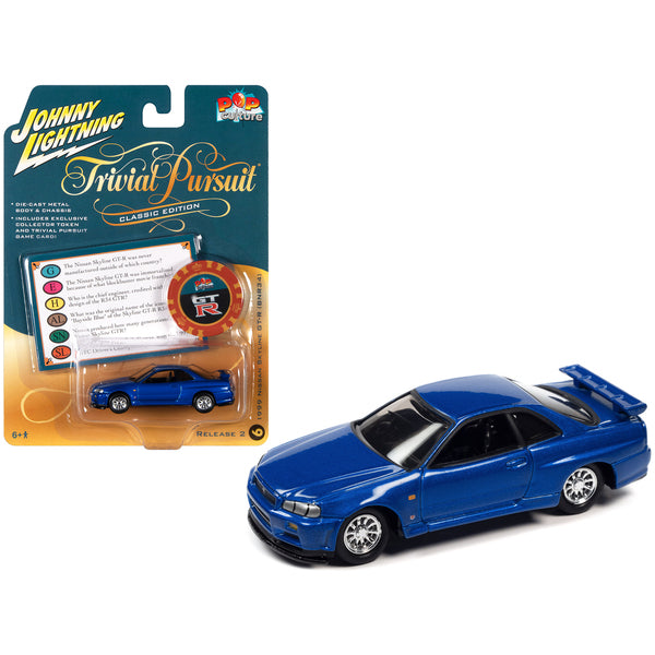 1999 Nissan Skyline GT-R RHD (Right Hand Drive) Blue Metallic with Poker Chip Collector's Token and Game Card "Trivial Pursuit" "Pop Culture" 2022 Release 2 1/64 Diecast Model Car by Johnny Lightning